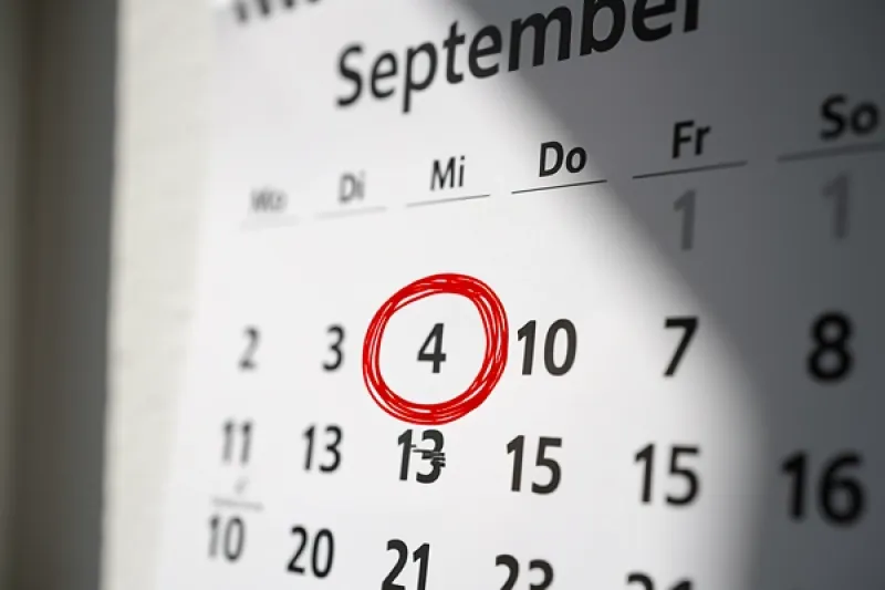 Nahaufnahme eines Kalenders bei dem ein Datum eingekreist ist